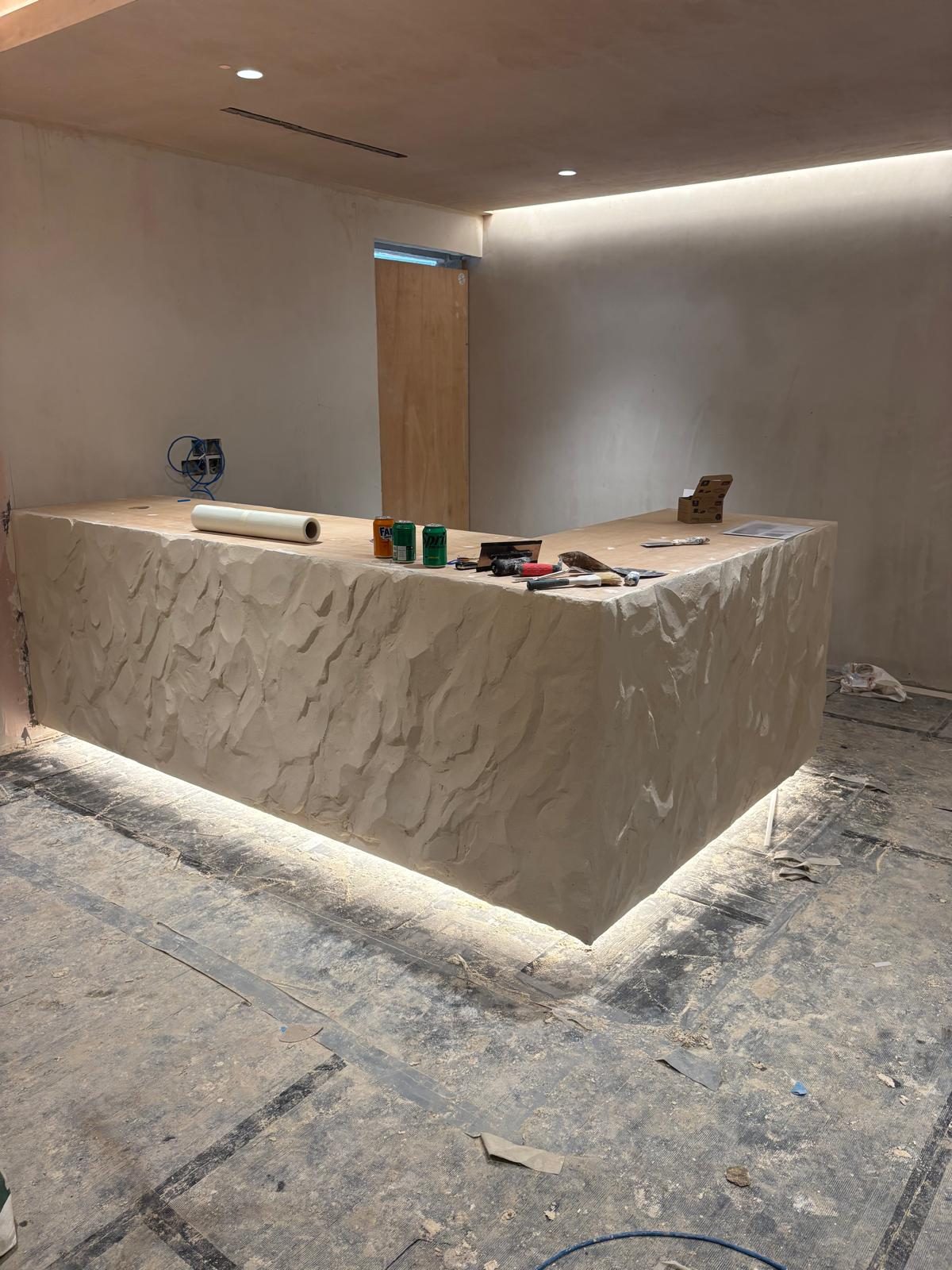 Wide view of stone reception desk