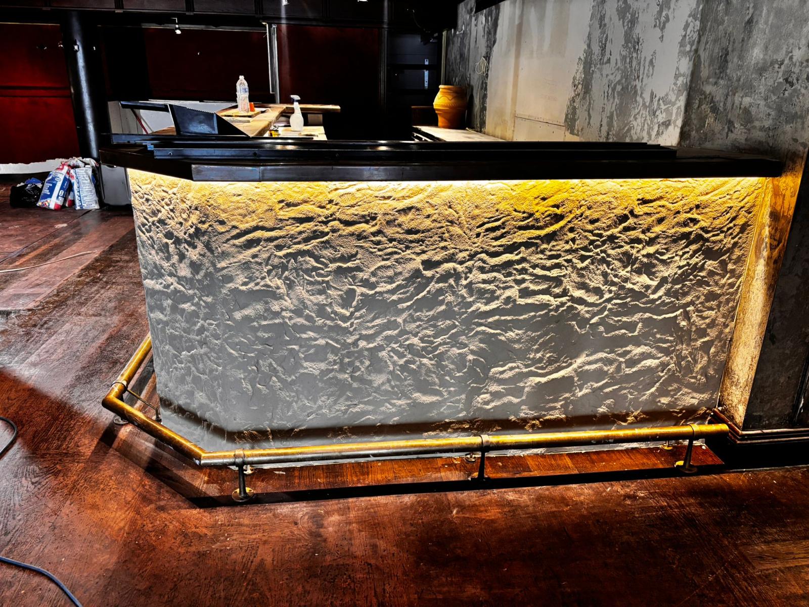Handcrafted stone bar counter front view