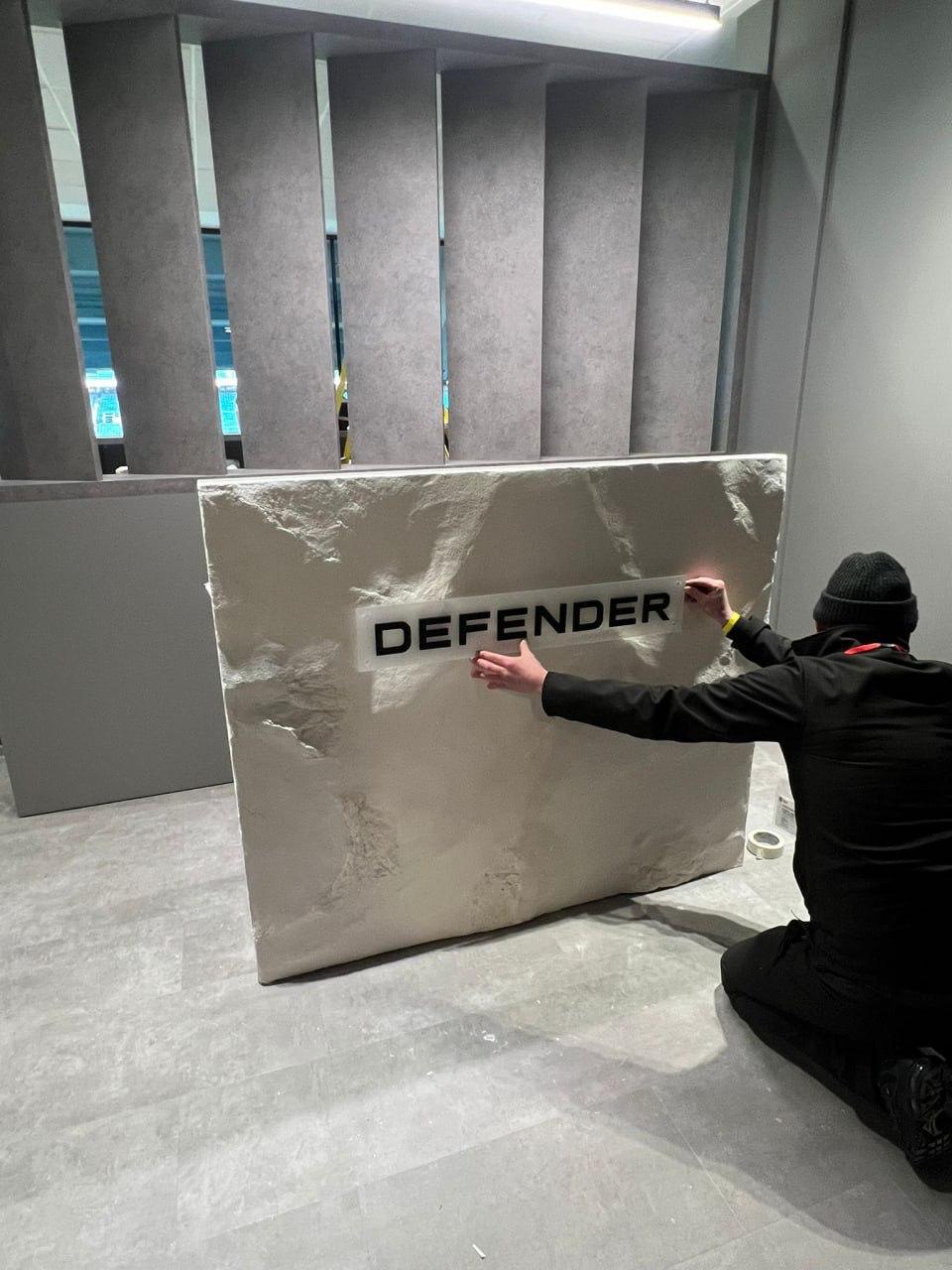 Defender branded rock panel installation